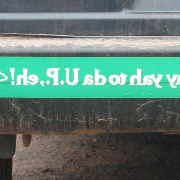 A bumper stick that says, "Say yah to da U.P., eh!"